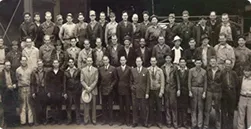 Our founder Earle M. Jorgensen pictured holding his popular white hat with the Los Angeles/Lynwood crew during the forties.